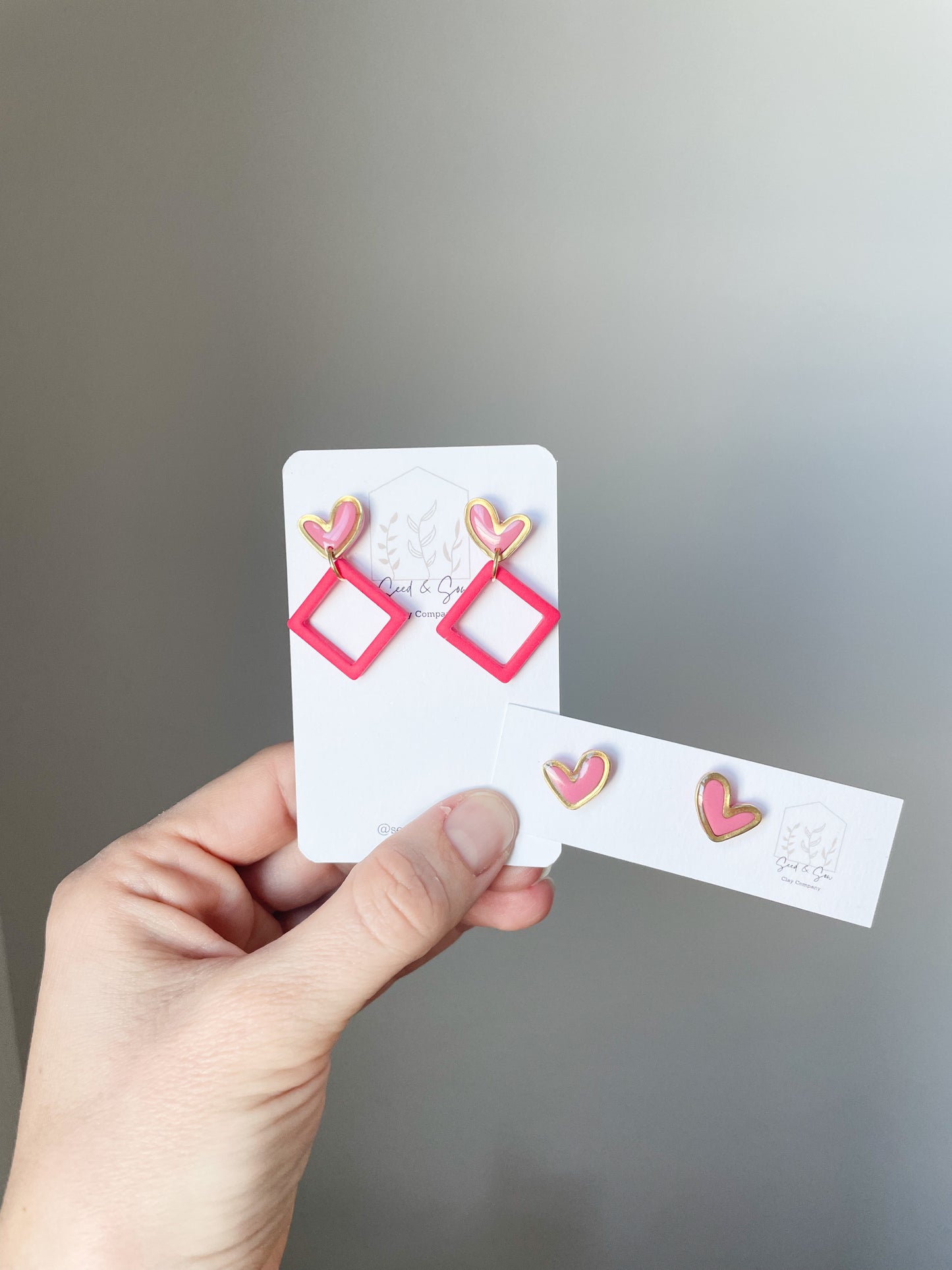 Gold trimmed heart dangle & gold trimmed heart stud