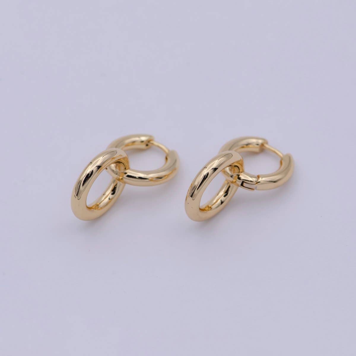 Dainty Intertwined Huggie Earrings with Round Dangle Charm Drop