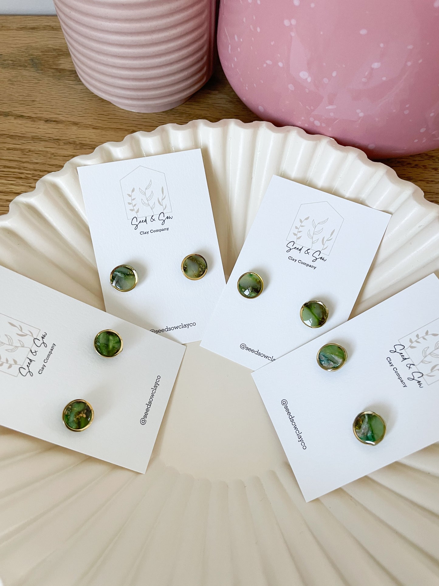 Gold rimmed Green marble studs