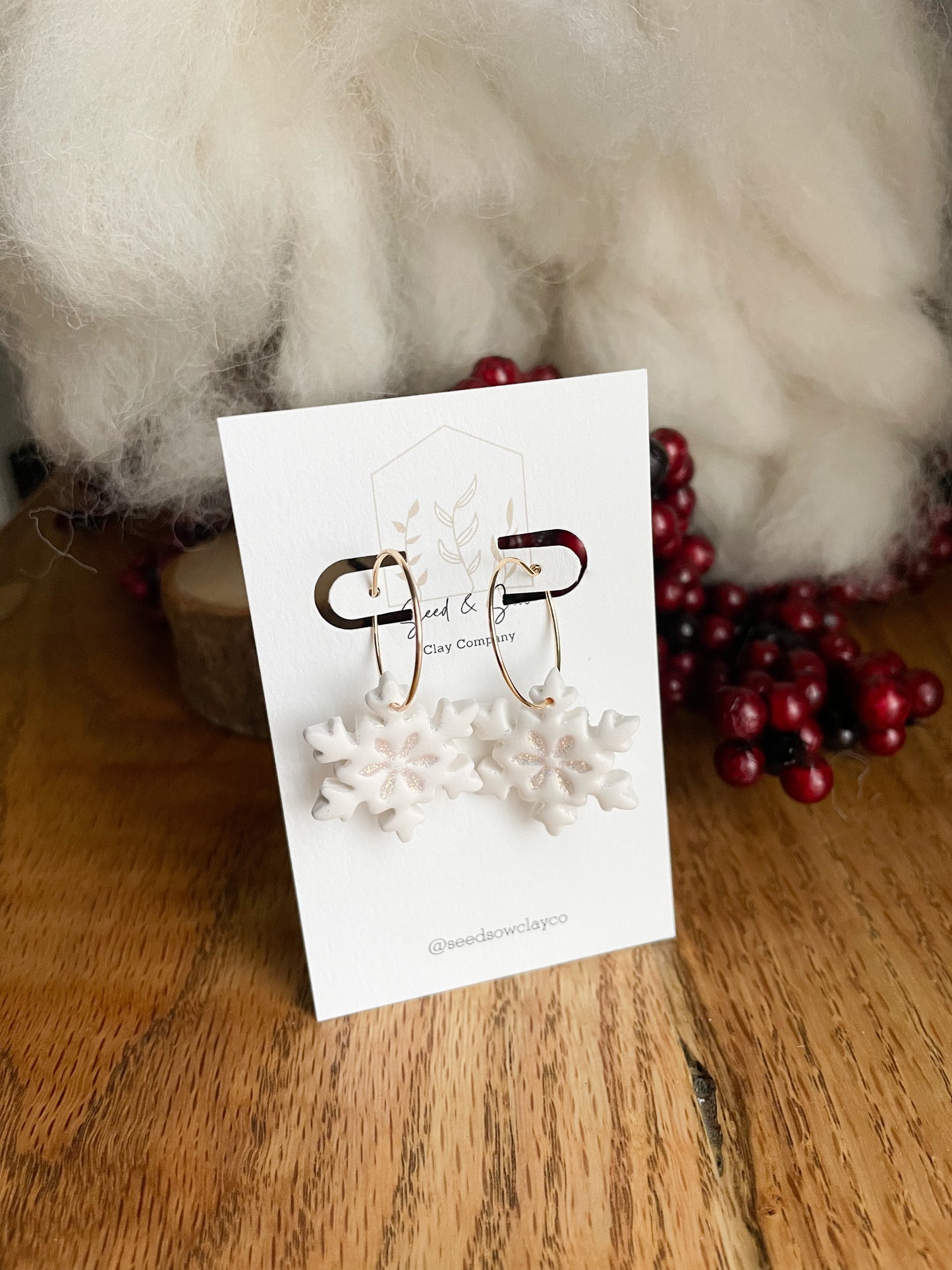 White Snowflake with Sparkle Center on Gold Hoop